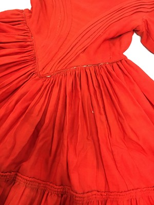 Lot 501 - An unusual scarlet wool day dress, 1840-45