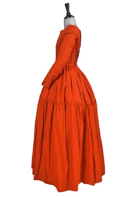 Lot 501 - An unusual scarlet wool day dress, 1840-45