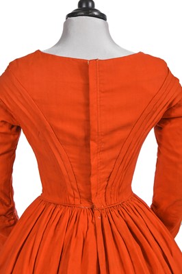 Lot 501 - An unusual scarlet wool day dress, 1840-45