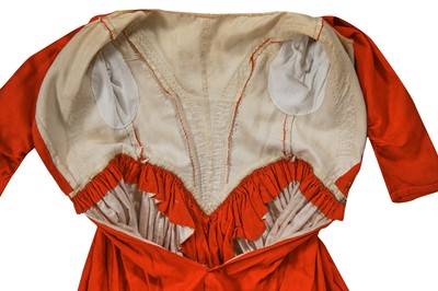 Lot 501 - An unusual scarlet wool day dress, 1840-45