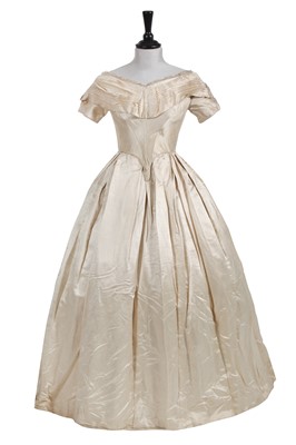 Lot 866 - An ivory satin bridal gown circa 1840