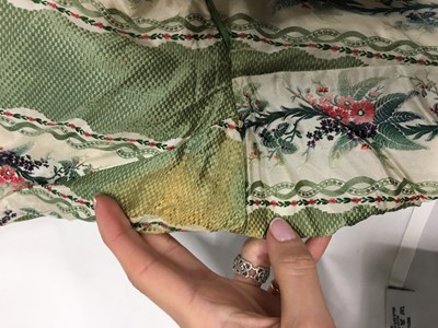 Lot 498 - A fine green striped and floral brocaded gown with day and evening bodices, circa 1854