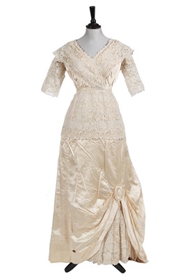 Lot 776 - A lace and satin bridal gown, 1910-12
