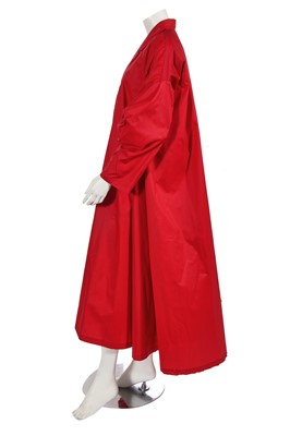 Lot 614 - A Norma Kamali red polyester parachute coat, 1980s