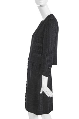 Lot 37 - A Gabrielle Chanel haute couture black herringbone silk suit, circa 1965