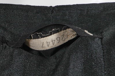 Lot 37 - A Gabrielle Chanel haute couture black herringbone silk suit, circa 1965