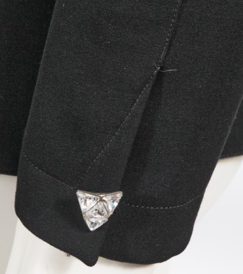 Lot 545 - A Thierry Mugler black grain de poudre collarless jacket, circa 1992