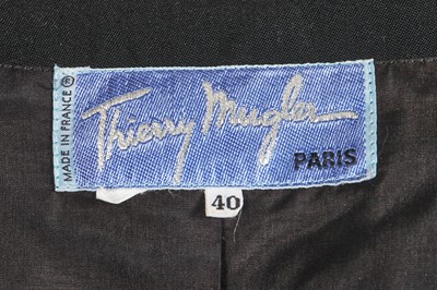Lot 545 - A Thierry Mugler black grain de poudre collarless jacket, circa 1992