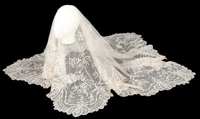 Lot 516 - A Brussels needlepoint appliqué wedding veil,...