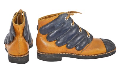 Lot 676 - A pair of Mr Freedom winged blue and yellow leather boots, 1970