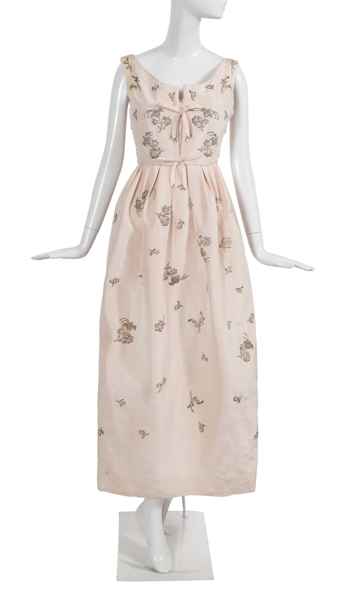 Lot 405 - A Christian Dior London by Marc Bohan embroidered blush faille 'Soirée Brillante' dress, Autumn-Winter 1960-61