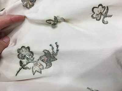 Lot 405 - A Christian Dior London by Marc Bohan embroidered blush faille 'Soirée Brillante' dress, Autumn-Winter 1960-61