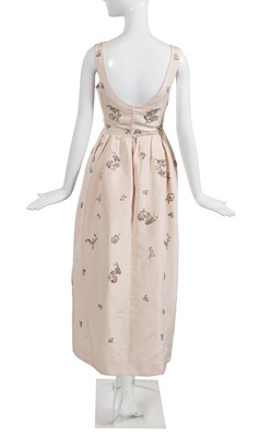 Lot 405 - A Christian Dior London by Marc Bohan embroidered blush faille 'Soirée Brillante' dress, Autumn-Winter 1960-61