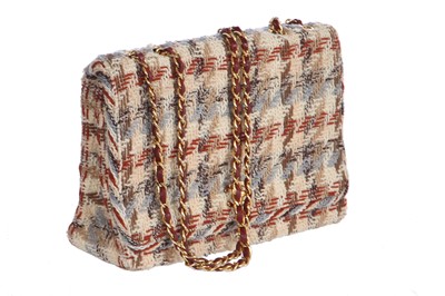 Lot 34 - A Chanel by Karl Lagerfeld tweed flap bag, 1980s