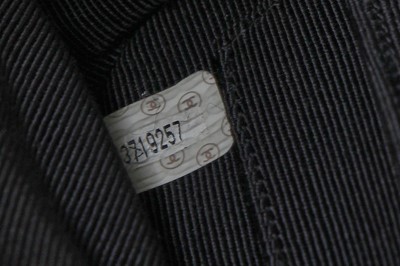 Lot 31 - A Chanel by Karl Lagerfeld quilted black bouclé bag, Autumn-Winter 1995-96