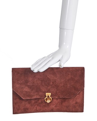 Lot 42 - A Cartier brown suede bag, 1936