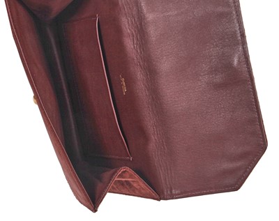 Lot 42 - A Cartier brown suede bag, 1936