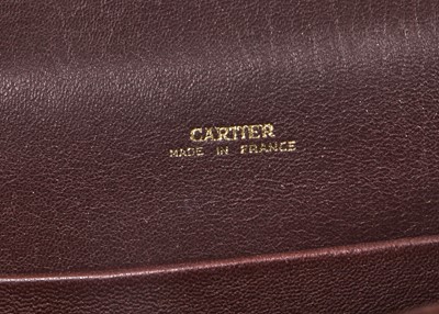 Lot 42 - A Cartier brown suede bag, 1936