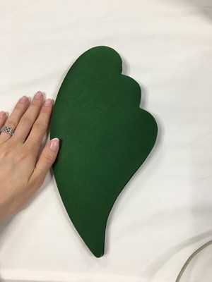 Lot 393 - A Pierre Cardin green satin bag, 1960s