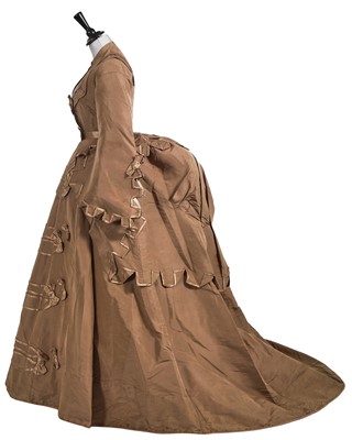 Lot 854 - A satin trimmed brown silk faille day/reception dress, late 1860s