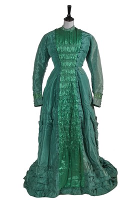 Lot 838 - A green faille and satin evening gown, circa 1879