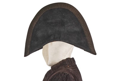 Lot 179 - A voided velvet coat and a bicorne, 1780-1810s