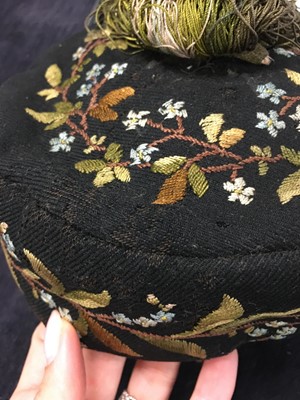 Lot 173 - A group of embroidered smoking and Argyll caps, late 1870s-1880s
