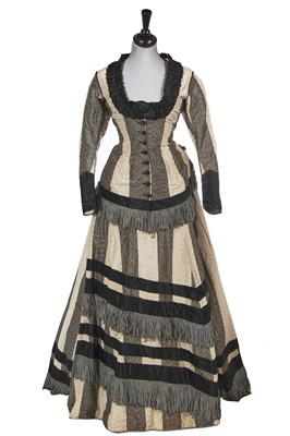 Lot 840 - A striped flecked silk taffeta gown, circa 1876