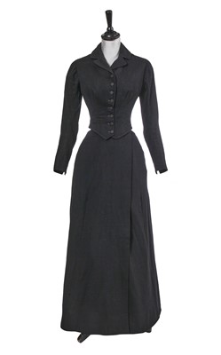 Lot 821 - A navy wool side-saddle riding habit, circa 1890
