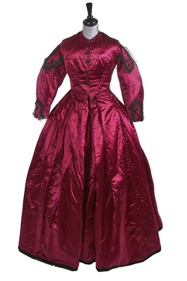 Lot 856 - A mulberry satin evening gown, circa 1859