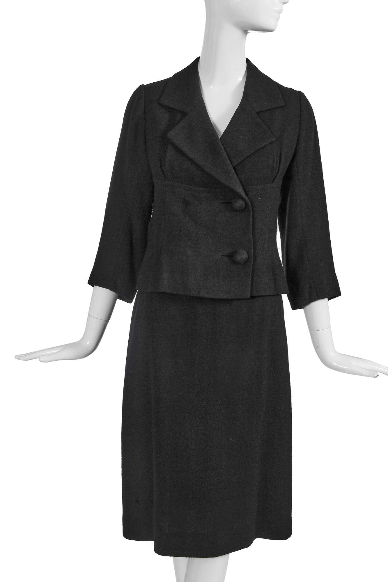 Lot 420 - A Cristóbal Balenciaga haute couture black wool suit, 1961
