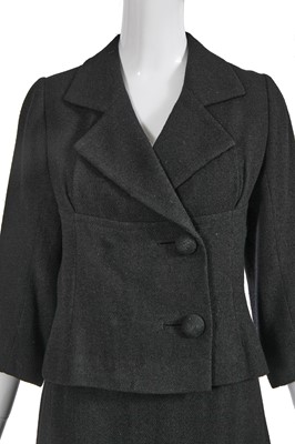 Lot 420 - A Cristóbal Balenciaga haute couture black wool suit, 1961