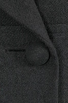 Lot 420 - A Cristóbal Balenciaga haute couture black wool suit, 1961