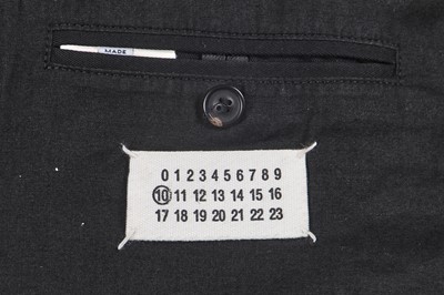 Lot 138 - A Maison Martin Margiela men's black cotton gabardine coat, Spring-Summer 2007