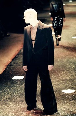 Lot 24 - A rare Alexander McQueen men's black rayon-blend suit, 'Joan' collection, Autumn-Winter 1998-99