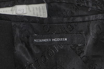 Lot 24 - A rare Alexander McQueen men's black rayon-blend suit, 'Joan' collection, Autumn-Winter 1998-99