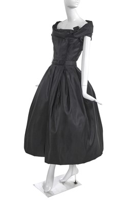 Lot 430 - A Christian Dior haute couture black faille 'Amour' cocktail dress, 'A-line', Spring-Summer 1955