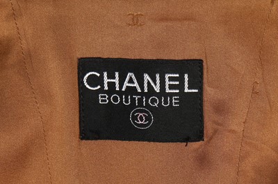 Lot 104 - A Chanel herringbone tweed suit, Autumn-Winter...