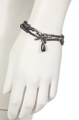Lot 248 - A Christian Dior by John Galliano necklace and two bracelets, 2000s