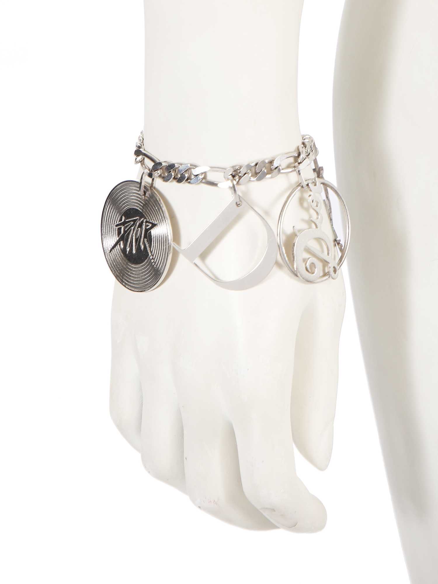 Lot 251 - A Christian Dior by John Galliano metal charm bracelet, 2000s