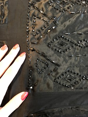 Lot 459 - A Jeanne Lanvin beaded black silk evening dress, Summer 1921