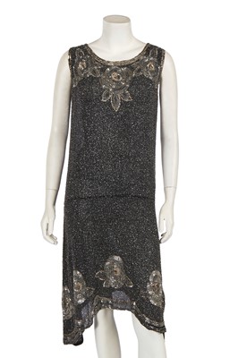 Lot 754 - A beaded black muslin flapper dress, 1928-29