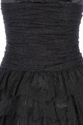 Lot 175 - A Chanel black lace cocktail dress, 1990s,...