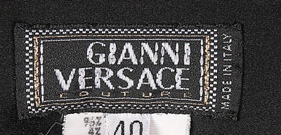 Lot 180 - A Gianni Versace black silk jersey...