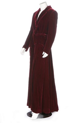 Lot 228 - A Givenchy claret-coloured velvet evening coat,...