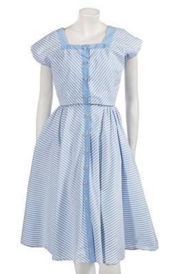 Lot 728 - A blue and white striped cotton day ensemble, identical to one worn by Queen Elizabeth II, late 1950s