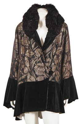 Lot 746 - A black lamé brocade and fur opera jacket, 1930s