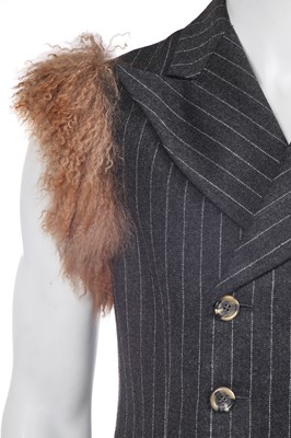 Lot 20 - A rare Alexander McQueen men's Mongolian lamb and pinstriped grey wool sleeveless jacket, 'Dante' collection, Autumn-Winter 1996-97