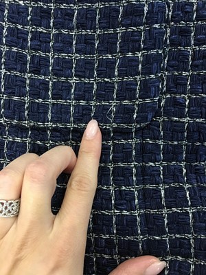 Lot 1 - A fine Chanel by Karl Lagerfeld fantasy tweed checked coat, 'Paris Cosmopolite' collection, Metiers d'Art, Pre-Fall 2017