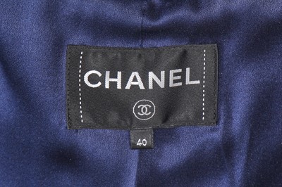 Lot 1 - A fine Chanel by Karl Lagerfeld fantasy tweed checked coat, 'Paris Cosmopolite' collection, Metiers d'Art, Pre-Fall 2017